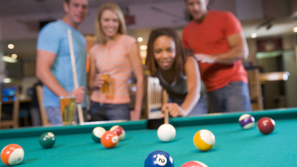 Playing Pool at Ladram Bay Amusements